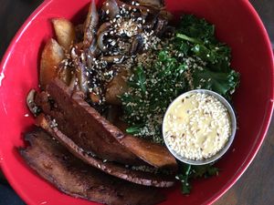  Breakfast bowl of seasonable veggies and vegan bacon served with dragon sauce. at Wild Leek in Halifax