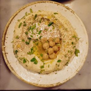 (VE) Hummus with a pita on the side. It's a good hummus. at The Picturedrome in Macclesfield