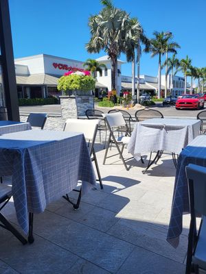 Outside and inside seating at Em-On's Thai Cafe in Naples