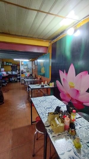 Inside the restaurant.  A local place, don't expect fancy seating. at Quán Chay Diệu Hoa in Hoi An
