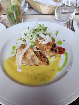 Spring roll style veggies with side and sauce. at Városliget Café in Budapest