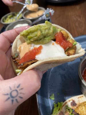 Taco close up with all the sides on top   at Scoundrel in Christchurch