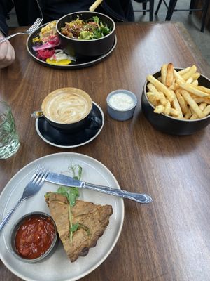 Buddha bowl, fries, flat white and quiche (all vegan of course)  at Scoundrel in Christchurch