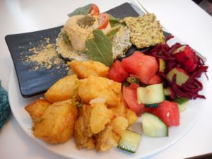 Raw dish made from basil, cashews, coconut, and more.  Plus three salads/sides.  Delicious! at Glo - Laugavegur in Reykjavik