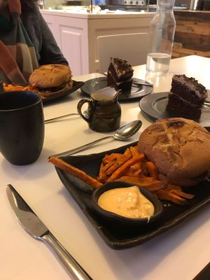 Pulled Oumph burger, chocolate cake and oat milk Americano. at Glo - Laugavegur in Reykjavik