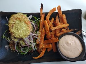Black bean burger with gluten free bread and sweet potato fries. Vegan and gluten-free. at Glo - Laugavegur in Reykjavik