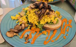 Scrambled Tofu with mushrooms, fresh spinach, and marinated chickpeas at Nourish Wellness Cafe - Pop Life  in Cleveland