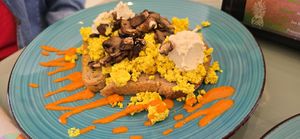 Scrambled Tofu with mushrooms and vegan Feta cheese on whole wheat toast at Nourish Wellness Cafe - Pop Life  in Cleveland