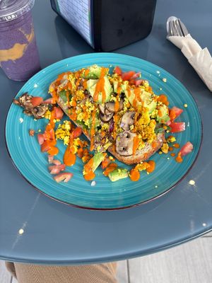 Tofu scramble and smoothie yum  at Nourish Wellness Cafe - Pop Life  in Cleveland