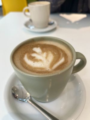 Decaf oat milk cappuccino   at Grassmarket Community Project & Coffee Saints Cafe in Edinburgh