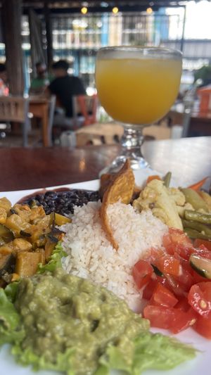 Vegan plate and fresh mango juice (giant glass)  at Soda Viquez in La Fortuna