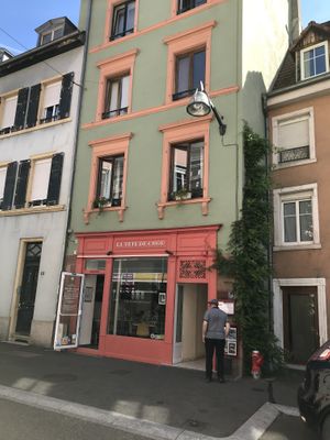 Don’t be confused by the old signage that is more visible than the restaurants actual name    at Eve au Paradis Vegan in Mulhouse