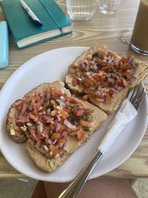 Bruschetta with humous   at Swell Cafe and Bar Pacifico Siargao in Siargao