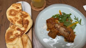 Rendang and flat bread  at Kommune Lebuh Victoria in Penang