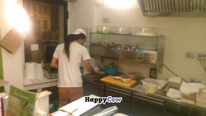 Busy making burgers at Universo Vegano - Navigli in Milan