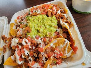 Nachos!!! Fresh, delicious, bomb 💣 at El Cantaro Vegan Mexican Restaurant in Monterey
