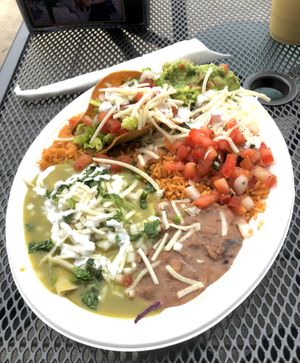 Combo #3 (crispy potato taco, chicken taquito, and enchilada with green sauce) at El Cantaro Vegan Mexican Restaurant in Monterey