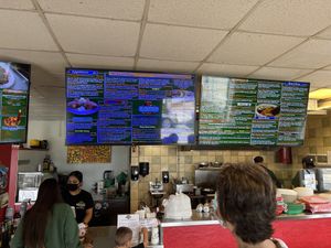 Enormous menu  at El Cantaro Vegan Mexican Restaurant in Monterey