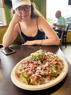 Big nachos! Delicious. Has refried beans, guac, fake sour cream & fake cheese.   at El Cantaro Vegan Mexican Restaurant in Monterey