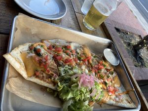 Quesadilla. Requested crema on the side. Beer.  at El Cantaro Vegan Mexican Restaurant in Monterey