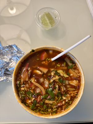 Pozole soup with TONS of onion and LOTS of salt. Only able to had a few sips. ☹️Think twice before ordering.   at El Cantaro Vegan Mexican Restaurant in Monterey