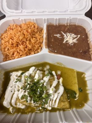 pinto beans rice and green sauce spinach enchilada.  at El Cantaro Vegan Mexican Restaurant in Monterey