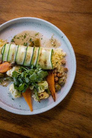 Zucchini wraps with couscous, toasted chickpeas, and olive-herb sauce at Copper Bonnet in 