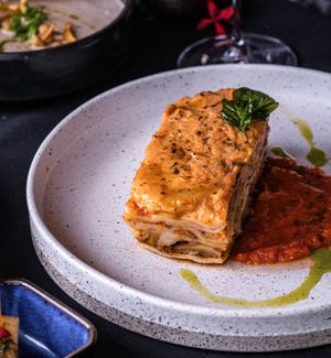 Vegan Jackfruit Lasagne featuring house-made, vegan noodles and a savory tomato ragu. Available for our Christmas Set Menu from 24-25 December at Copper Bonnet in 