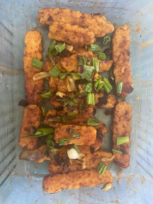 Bqq chickpea tempeh sprinkled with green pepper and green onion in a coco bbq sauce  at Suka Kitchen Culebra  in Culebra