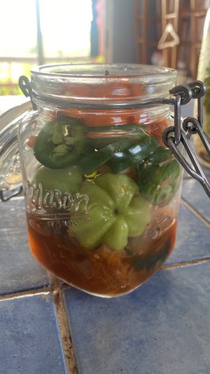 Kimchi, local peppers, jalapeño, garlic, carrot, local tumeric from my farm😉 at Suka Kitchen Culebra  in Culebra