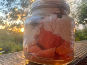 vanilla coco yogurt with a grain free sprouted granola cherries and papaya 
 at Suka Kitchen Culebra  in Culebra