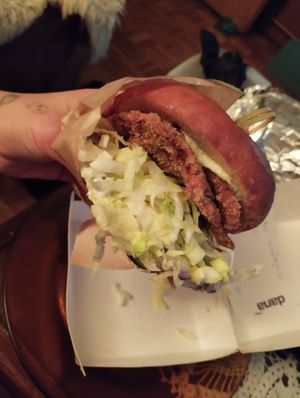 Burger with breaded oyster mushroom at Crusty Kuhna in Ljubljana