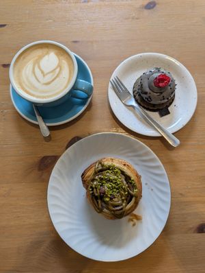 pistacho croissant and black sesame dessert at Les Belles Âmes Pâtisserie in Lyon