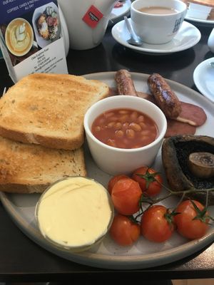 Vegan breakfast; vegan sausages & bacon, mushrooms, baked beans, vine tomatoes and toast with vegan spread at Cool River Cafe in Matlock