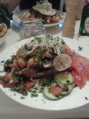 Stuffed sweet potato on a bed of salad at Krawummel in Muenster