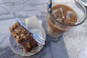 carrot cake w cinnamon frosting & Ice Coffee w soy milk at Piece Of Cake in Maastricht