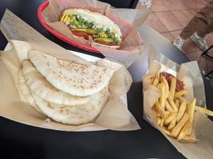 Veggie hot dog, pita, and fries (all vegan) at Chicago Grill in Appleton