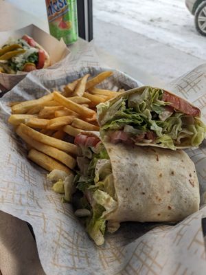 Falafel wrap with fries. at Chicago Grill in Appleton