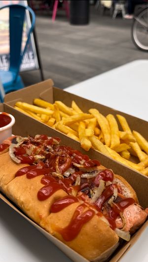 Hot dog and fries  at Moving Mountains Kitchen in East London