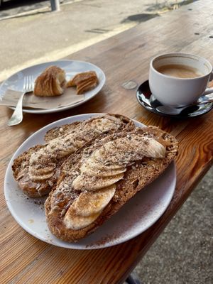 Vegan banana & peanut butter sourdough toast with a vegan croissantt  at Tilt in Brighton