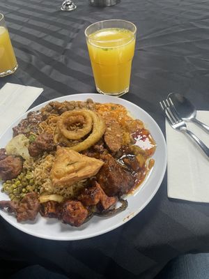 The fruit juice had a bit of kala namak added to it   at Veg Delight   in Edmonton