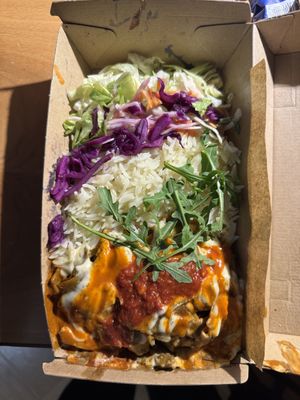 Seitan donner plate: cabbage salad, rice, saucy sliced seitann  at Just Vege - Forum in Helsinki