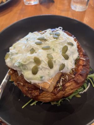 Smoked stuffed pumpkin with curried Dahl, spinach, tofu, pepita seeds,shredded coconut, spiced coconut yoghurt and mint    at Riverview Bar & Bistro  in Mannum