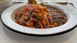 Arroz com lentilhas, feijão carioca, batata inglesa assada e cebola  at Refettorio Gastromotiva in Rio De Janeiro