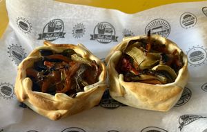 Photo doesn’t do these justice … full of veggies & so tasty!  at Atelier de Viveres in Puerto Madryn