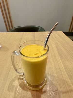 Mango 🥭 lassi 😋  at Alice & Friends at The Glen in Glenview