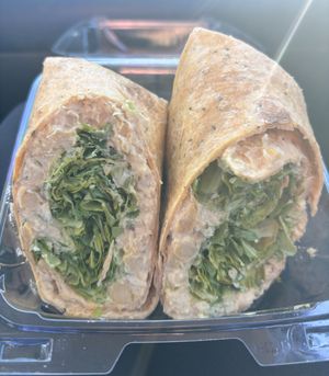 Vegan chickpea wrap! So good!! Soft wrap, creamy chickpea filling with arugula!   at The Dez Fine Food in Joshua Tree