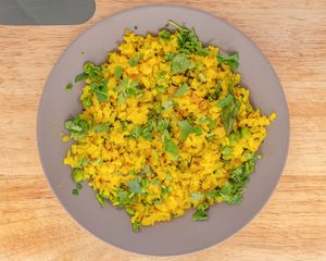 Poha-Flattened Rice(seasoned with Cummins, curry leaves, etc along with Onions and Peas) #Veganuary at Dhara's Chai House in Nelson