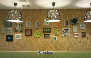 One of the walls inside the restaurant. This may give you some idea about the atmosphere. at Buddha Burgers in Haifa