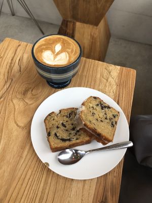 Soy latte and vegan passion fruit pound cake  at Poolside Coffee in Zushi